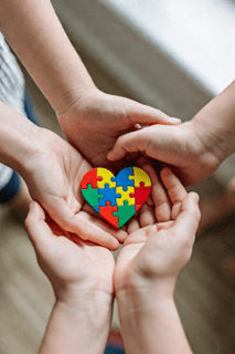 Parent and child working together at a table